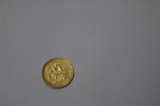 A George III gold sovereign, 1817, edge nick otherwise F.